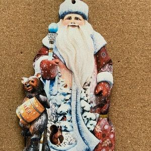 G. DeBrekht Santa with bear, squirrel, and, bird